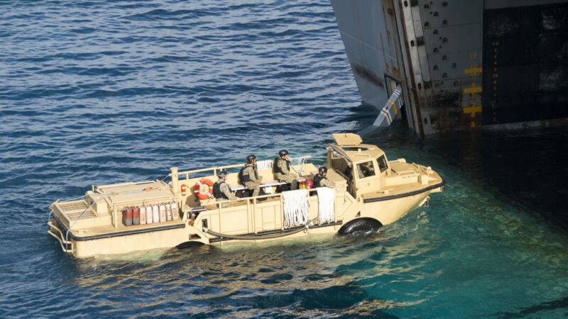 161029-N-TH560-094
OKINAWA, Japan (Oct. 29, 2016) A Landing amphibious resupply cargo five-ton (LARC-V) vehicle enters the well deck of amphibious transport dock ship USS Green Bay (LPD 20). Bonhomme Richard, flagship of the Bonhomme Richard Expeditionary Strike Group, is operating in the 7th Fleet area of responsibility in support of security and stability in the Indo-Asia Pacific region. The USS Green Bay (LPD 20) is participating with forward deployed Marines from III Marine Expeditionary Force for Exercise Blue Chromite, an annual U.S.-only exercise which strengthens the Navy-Marine Corps expeditionary, amphibious rapid-response capabilities based in Okinawa and greater Indo-Asia-Pacific region. (U.S. Navy photo by Petty Officer 3rd Class Jeanette Mullinax/Released)