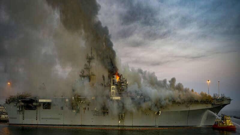 200710-N-MJ716-0498
SAN DIEGO (July 12, 2020) A fire continues to be fought into the evening on board the amphibious assault ship USS Bonhomme Richard (LHD 6) at Naval Base San Diego, July 12. On the morning of July 12, a fire was called away aboard the ship while it was moored pier side at Naval Base San Diego. Base and shipboard firefighters responded to the fire. Bonhomme Richard is going through a maintenance availability, which began in 2018. (U.S. Navy Photo by Mass Communication Specialist 2nd Class Austin Haist/Released)
