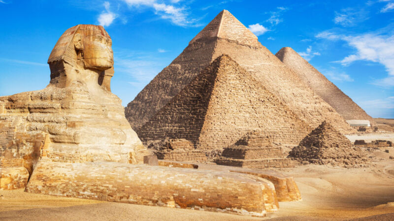 Egypt Cairo - Giza. General view of pyramids with Sphinx